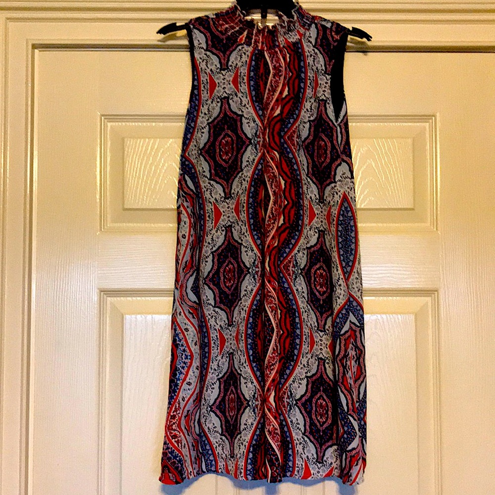 Girls size 12 dress.  Brand: Speechless. Multi-colored in perfect condition.